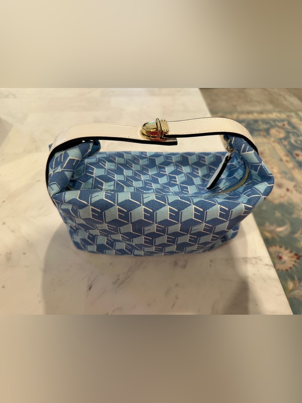 Estee Lauder Blue geometric patterned canvas cosmetic bag
